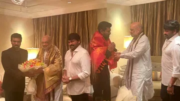 Amit Shah honored Ram Charan.. Megastar overwhelmed with enthusiasm.