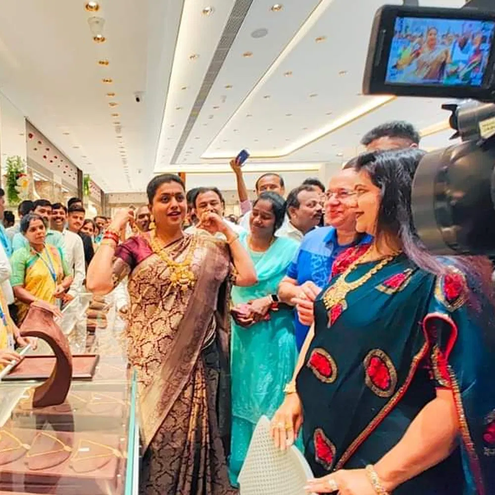 AP Minister Roja who opened a jewelery showroom.. 