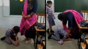 Student offered flowers at the teacher's feet and bowed.